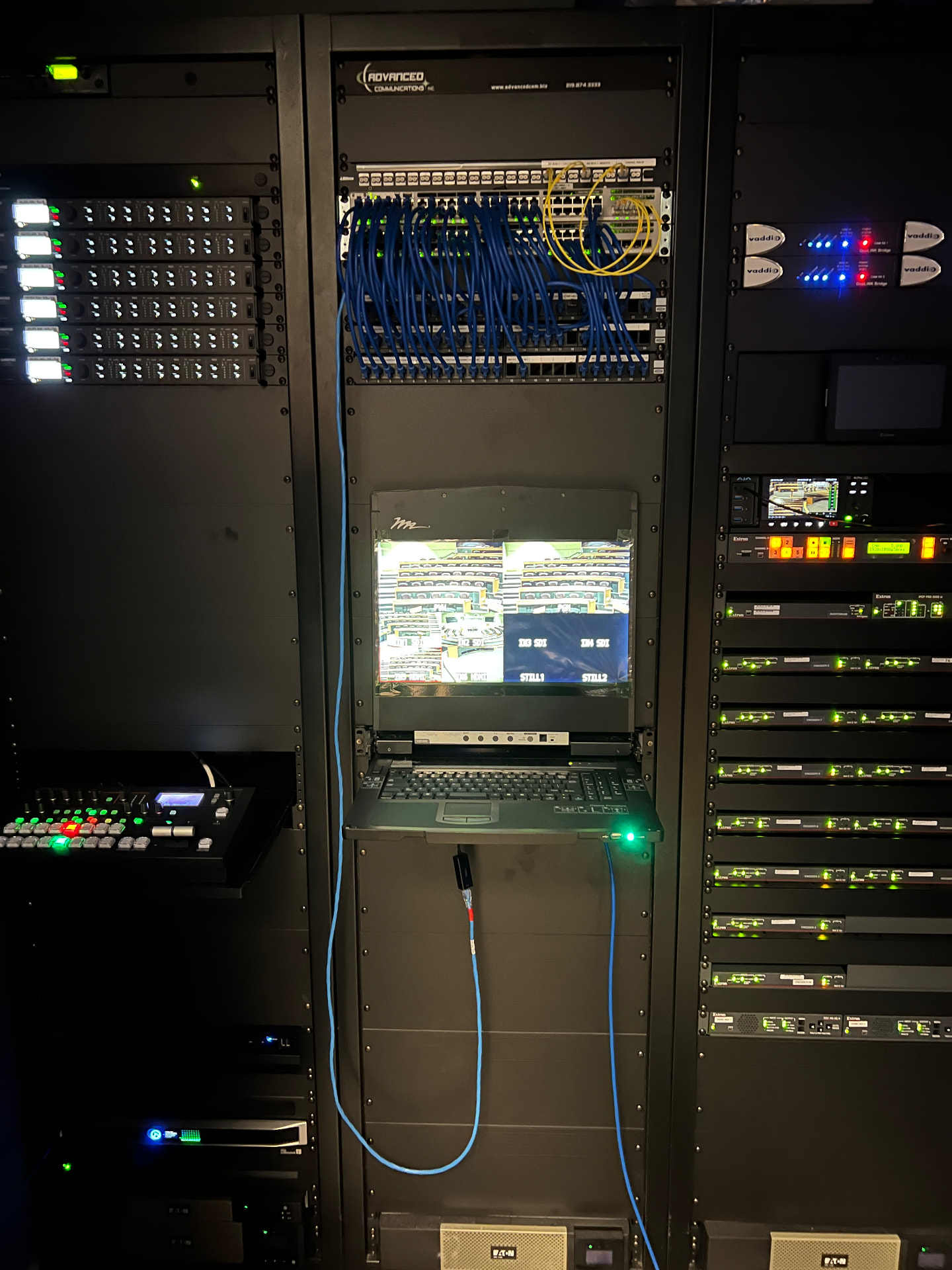 Central control rack: video routing, camera control, network switching, and monitoring.