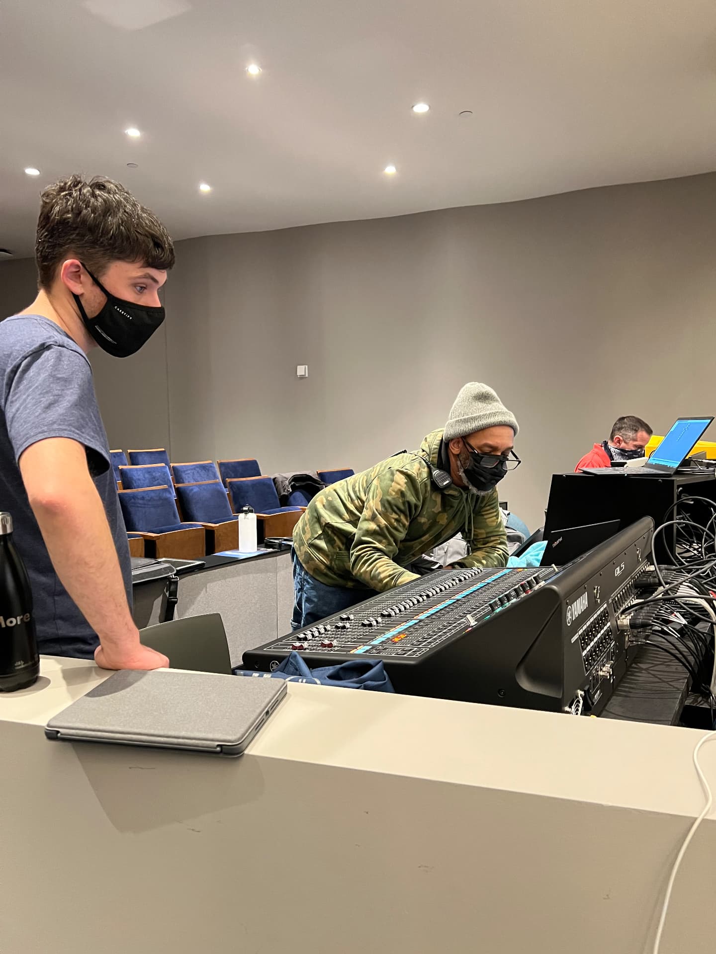 System commissioning at the front-of-house console with the install team.