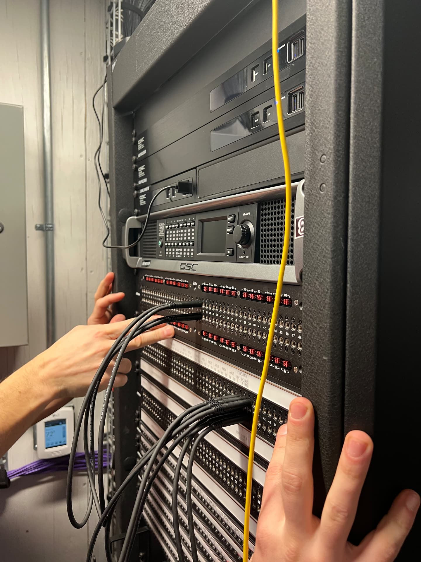 Amplifier and patch rack verification during checkout.