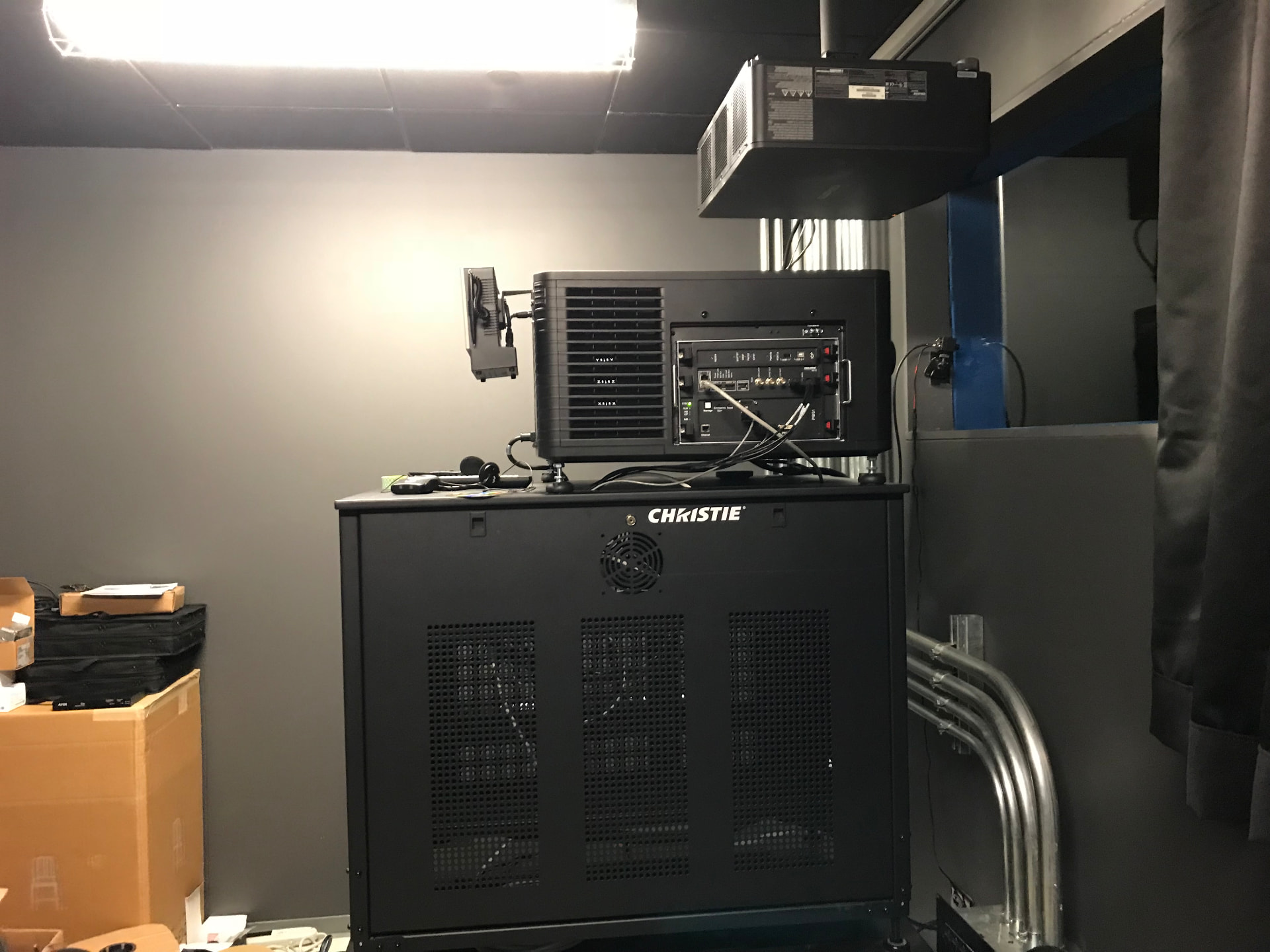 Christie cinema projector and processing rack in the projection booth.