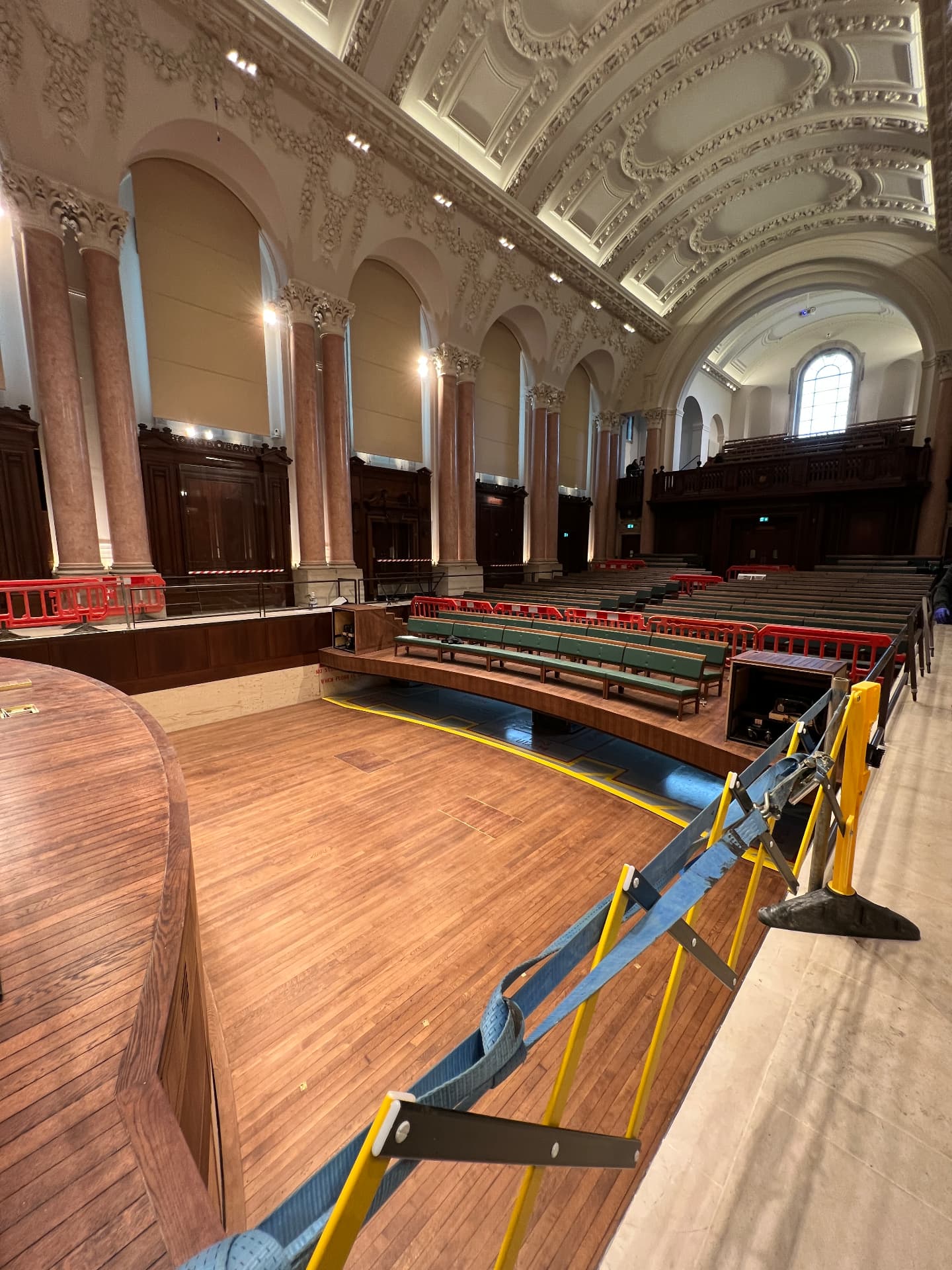Stage and forestage fit-out during construction, viewed from the platform.