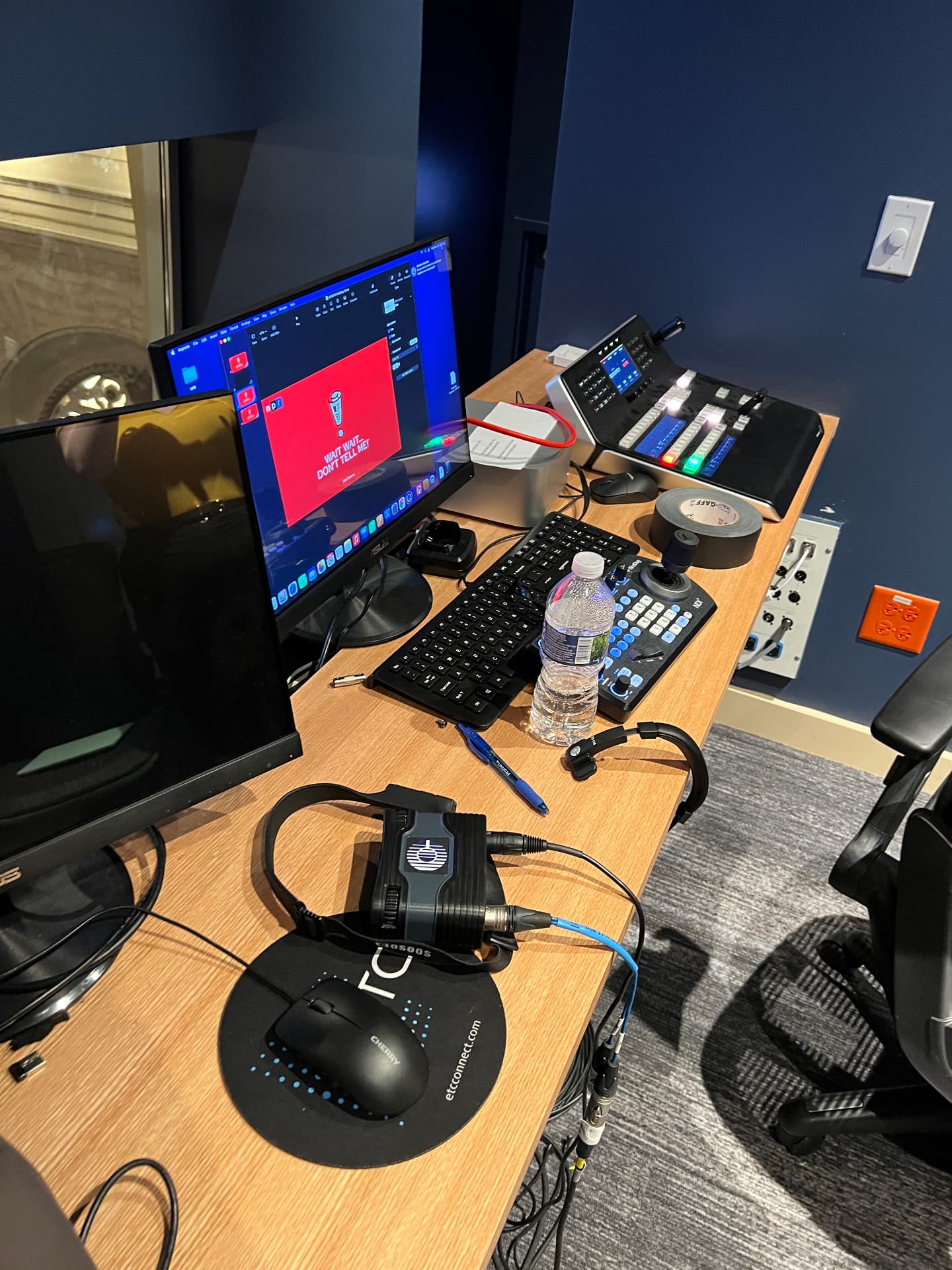 Control room operator position: lighting console, camera control, and intercom.