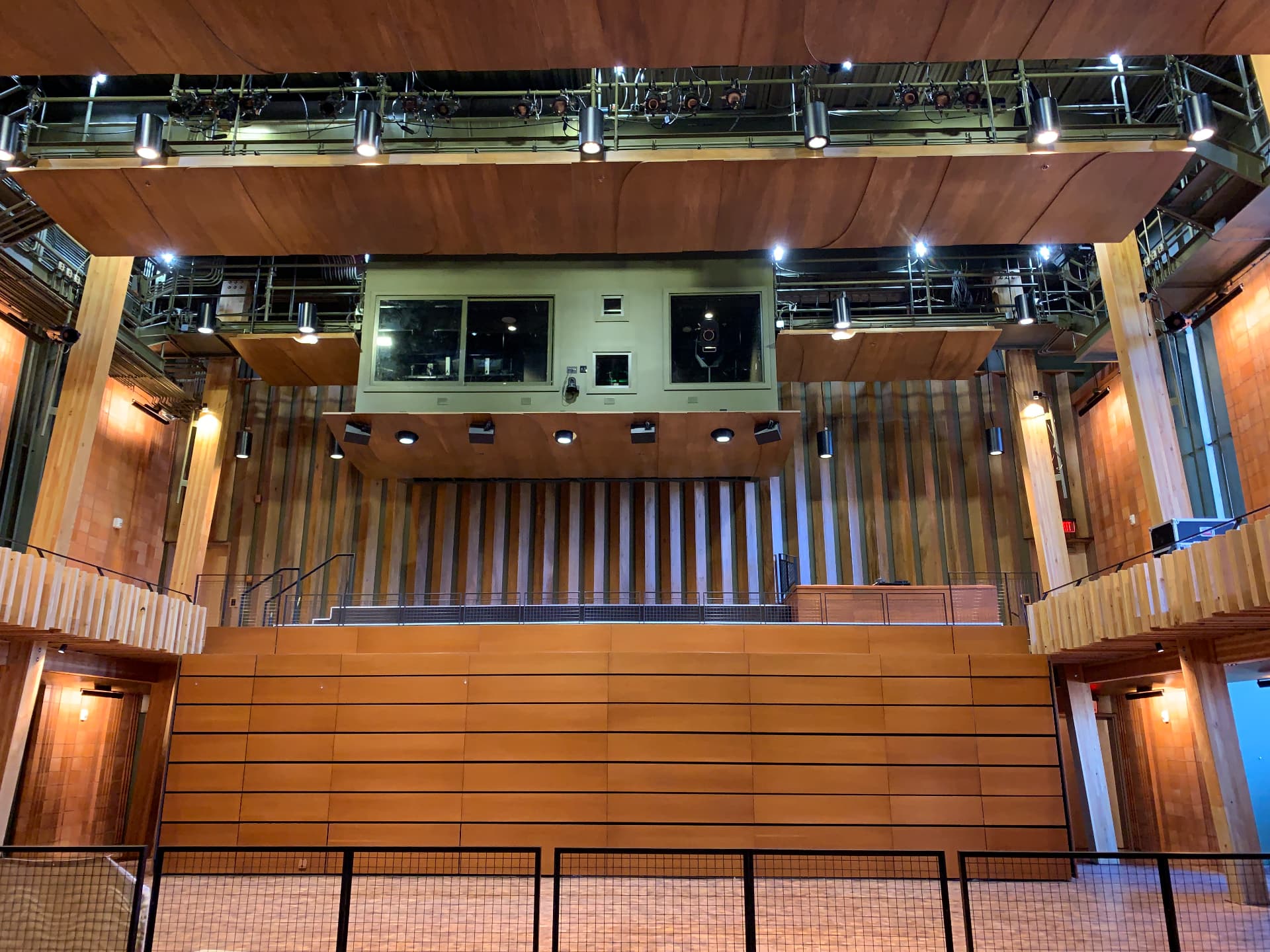 Rear of house showing the control booth, delay coverage, and overhead technical grid.