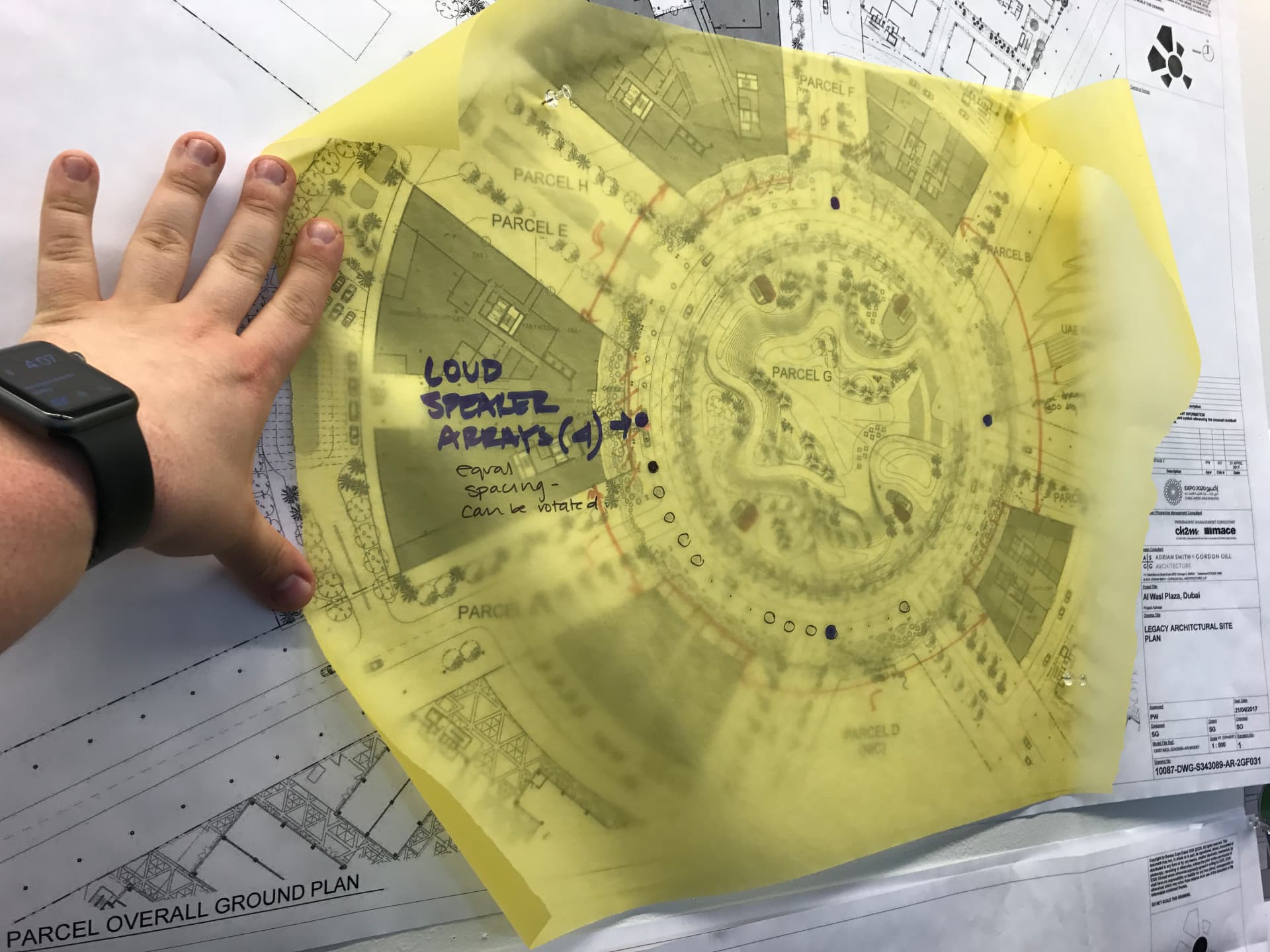 Working drawing overlay marking equally spaced loudspeaker array positions around the plaza.