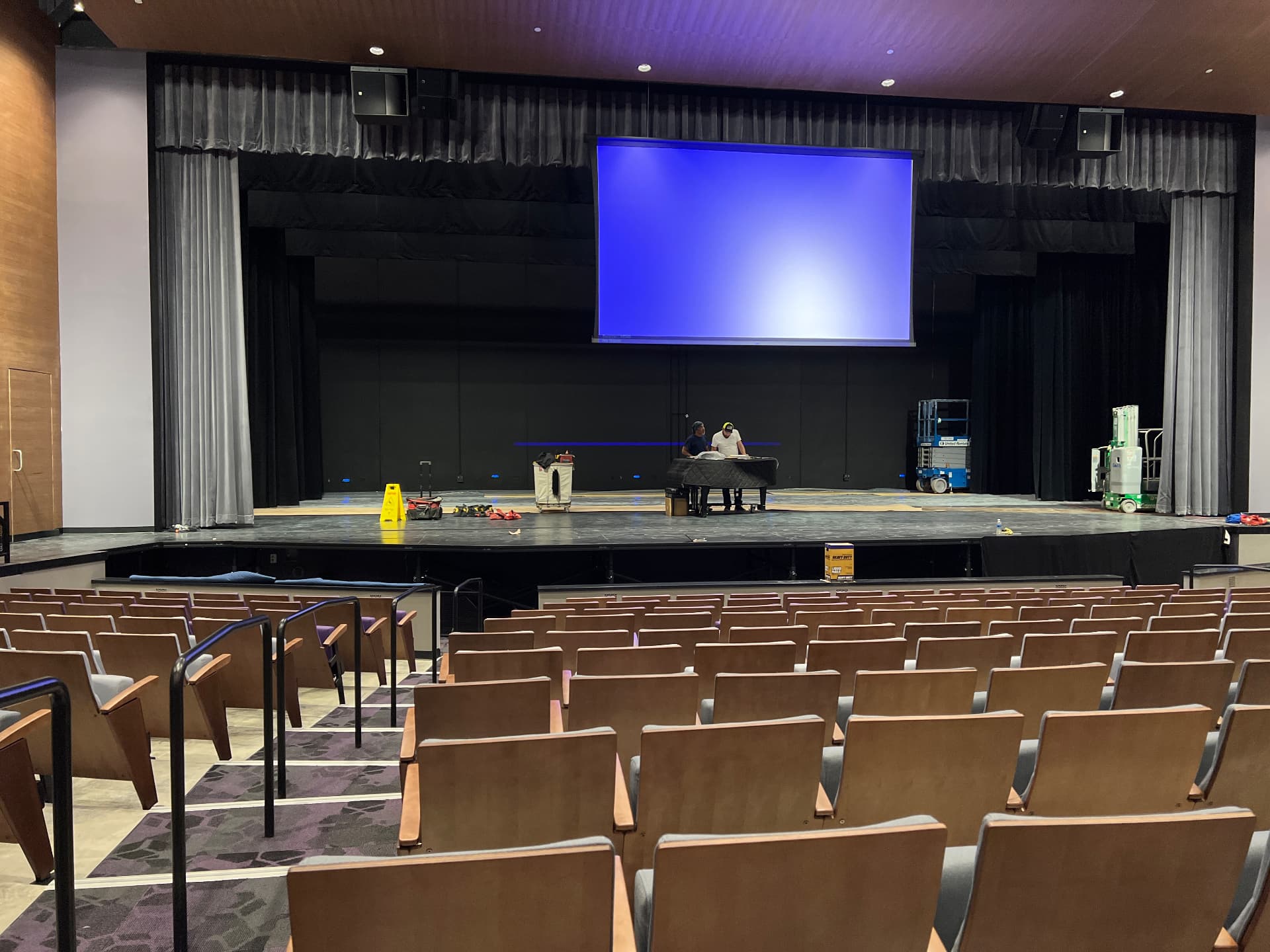 House view during projection alignment on the deployable stage screen.