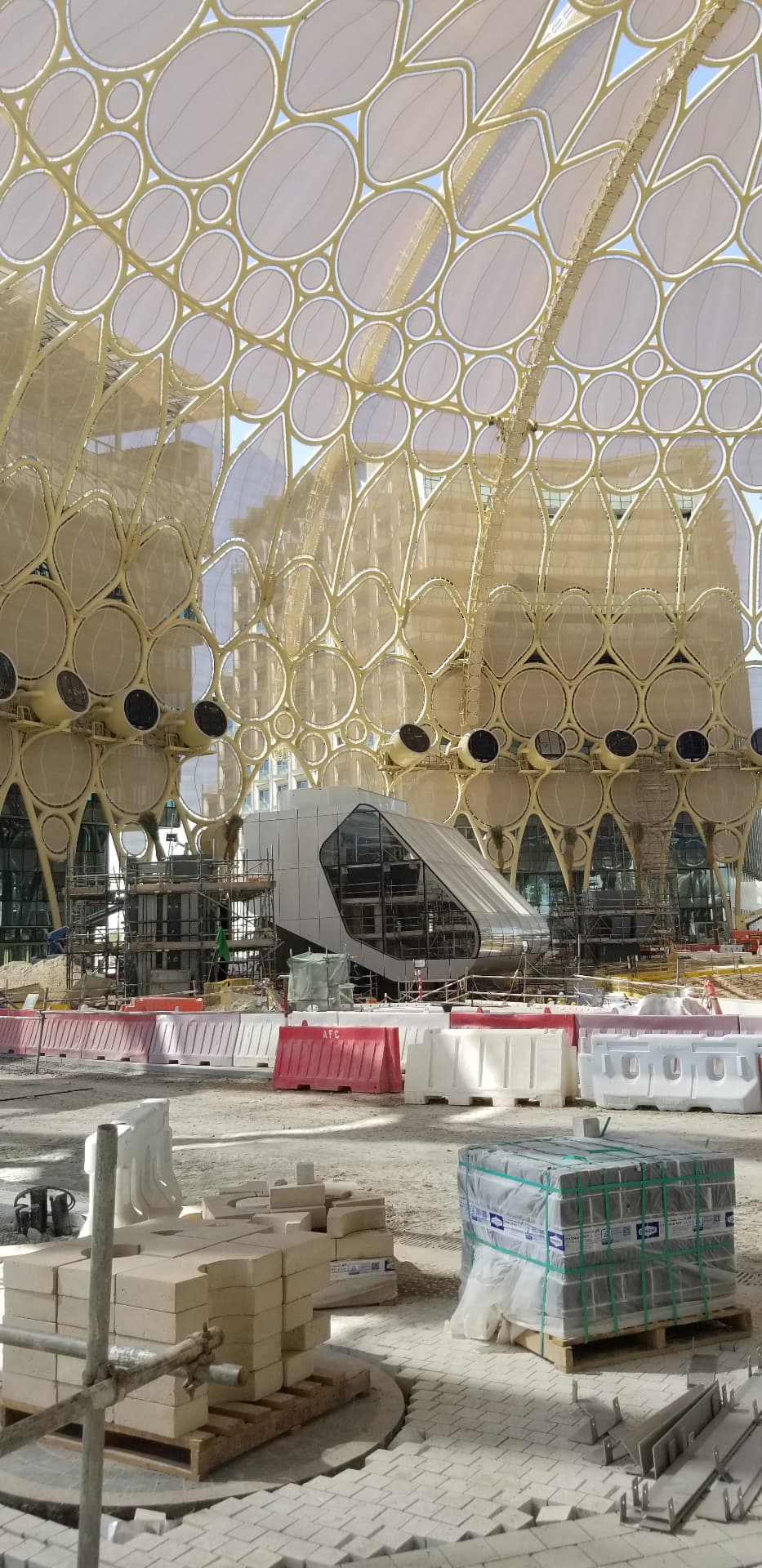 Under the projection surface, looking toward the plaza pavilions.