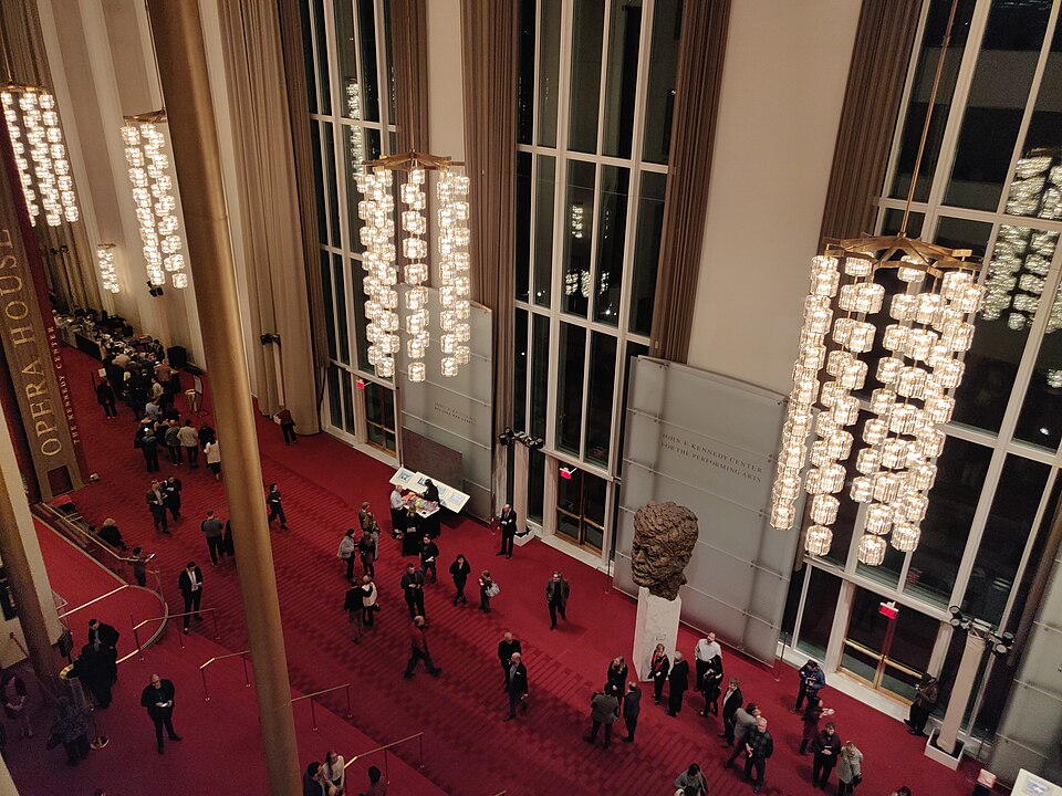 Patrons in the Grand Foyer of the Kennedy Center during an intermission.