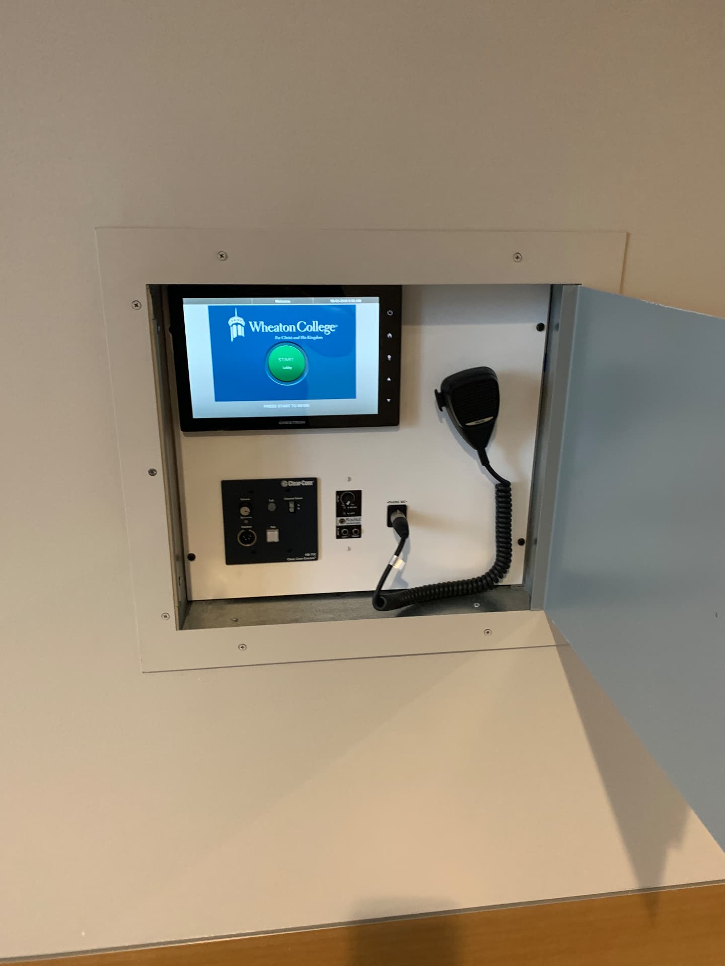 Backstage control panel: touchscreen, intercom, and paging station.